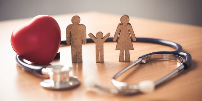 Critical Illness cover a wooden family with a stethoscope around them