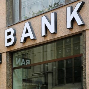 Close up of the word BANK on a building for the mortgage broker or bank blog