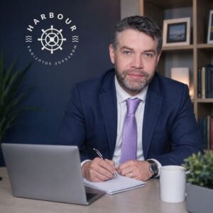 Nathan from Harbour Mortgage Solutions sat at a desk