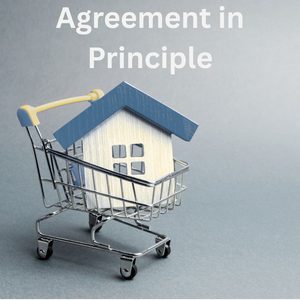 A model house in a trolley for the What is a Mortgage Agreement in Principle blog