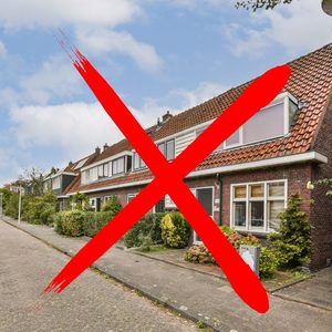Dorma houses with a red cross over the image